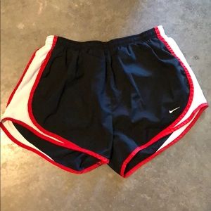 Black Nike running shorts